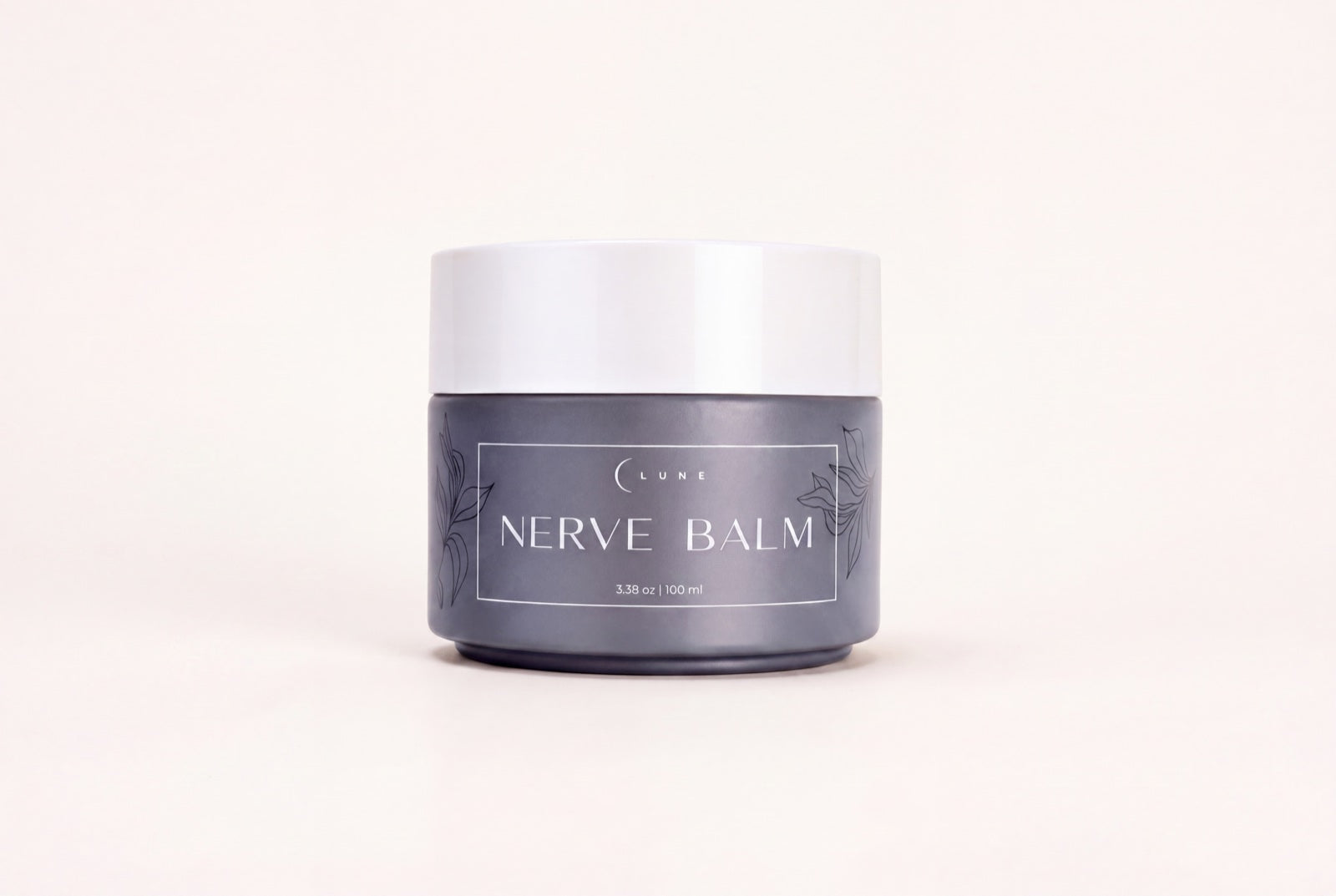 A jar of Lune Nerve Balm photographed on a plain light background.