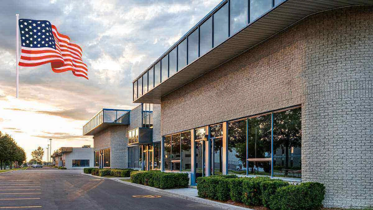 Lune manufacturing facility in the United States with an American flag flying outside